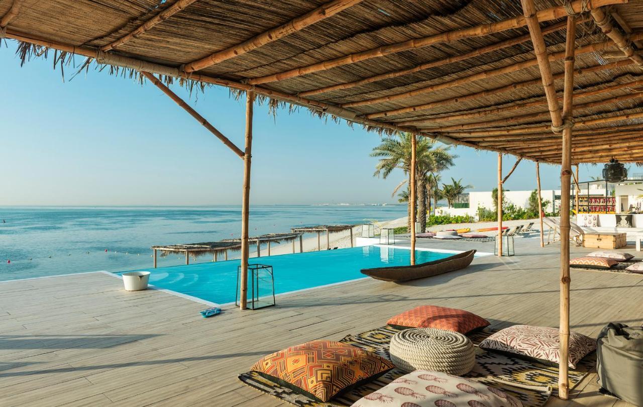 누라이 아일랜드 리조트 아부다비 외부 사진 The beach at the Chedi Muscat
